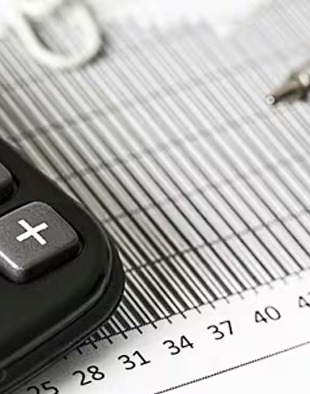 Is depreciation of real estate a good approach for property investors to lower their taxes?